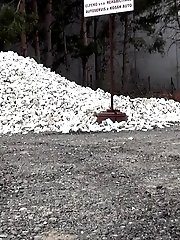 15 pictures - Cute girl pisses onto a pile of rubble