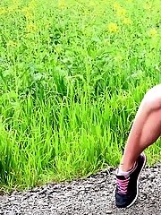 15 pictures - Blonde pissing in public in the middle of a road