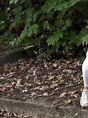 15 pictures - Dark haired babe squats outside and pisses