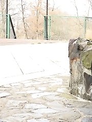 15 pictures - Blonde babe squats and pisses outside near a well