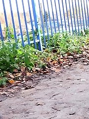 15 pictures - Sexy European makes a wet piss puddle outside
