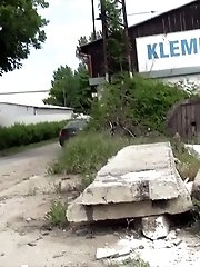 15 pictures - Hot blonde pisses onto a concrete slab