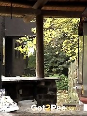 15 pictures - Counter top outdoor pissing for hot Eurobabe