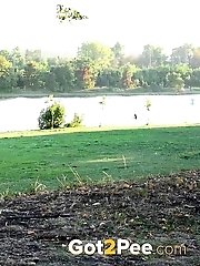 15 pictures - Pretty girl makes a pissy puddle on the ground