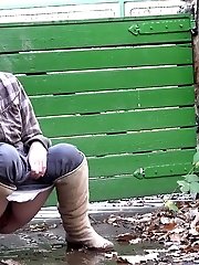 15 pictures - Sexy girl squats on a path and pisses outside