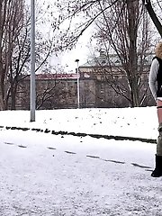 15 pictures - Dark haired babe turns the snow yellow