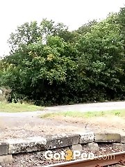15 pictures - Sexy brunette pisses over the train tracks