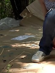 15 pictures - Redhead babe squatting to pee over cardboard