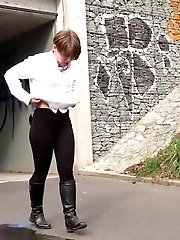 15 pictures - Short haired babe sprays her piss over the ground