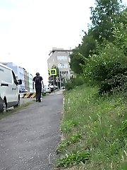 15 pictures - Outdoor pissing for hot babe in black denims