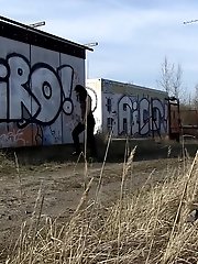 15 pictures - Pretty dark haired girl shows her ass to pee