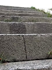 15 pictures - Full bladder babe in denim shorts makes a puddle