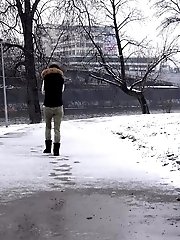 15 pictures - Dark haired babe turns the snow yellow