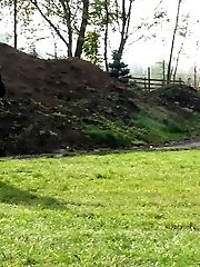 15 pictures - Sexy blonde pisses over the rocks outside