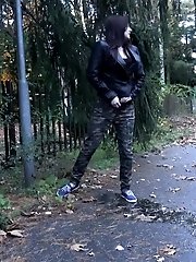 15 pictures - Dark haired babe pisses on a path