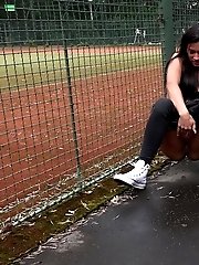 15 pictures - Gorgeous dark haired babe makes a huge piss puddle