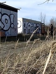 15 pictures - Pretty dark haired girl shows her ass to pee