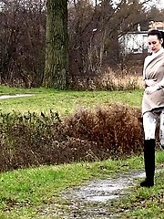 15 pictures - Dark haired babe relieves herself in public