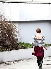 15 pictures - Short haired girl pisses in the middle of a path