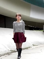 15 pictures - Short haired girl pisses in the middle of a path