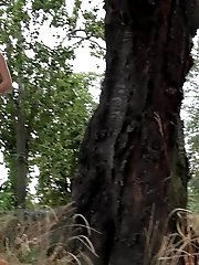 15 pictures - Bare pussy is on show in this outdoor peeing scene
