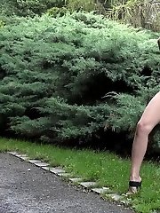 15 pictures - Hot brunette standing to pee against lamp post