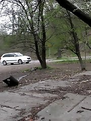 15 pictures - Blonde girl pisses in public as cars drive past