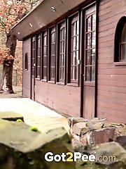 15 pictures - Chubby girl pisses outside on stone step