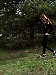 15 pictures - Pretty babe in glasses pisses outside