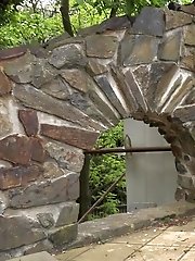 15 pictures - Brunette pulls down denims to piss outside