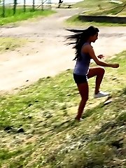 15 pictures - Gorgeous dark haired girl pisses near some stones