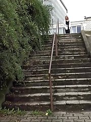 15 pictures - Cute girl in sneakers pisses on steps