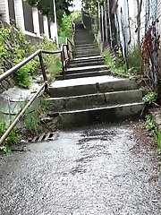 15 pictures - Blonde babe pees on the bottom of some steps