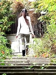 15 pictures - Sexy dark haired girl has a very long piss outside