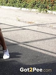 15 pictures - Pretty European squatting to piss outside