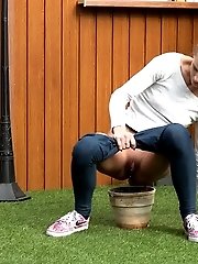 15 pictures - Pretty European relieves herself in plant pot