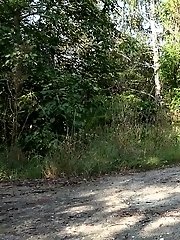 15 pictures - Short haired brunette wipes after pissing outside