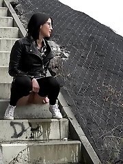 15 pictures - Pretty dark haired girl in glasses pees outside