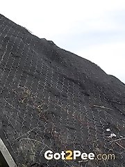 15 pictures - Pretty dark haired girl in glasses pees outside