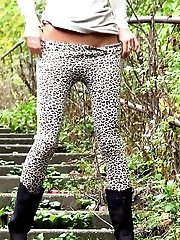 15 pictures - Sexy dark haired girl has a very long piss outside