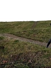 15 pictures - Dark haired babe pisses in the countryside