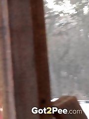 15 pictures - Gorgeous European pisses outside on a blue sheet