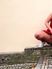 15 pictures - Closeup pissing action for puffy pussy lipped babe