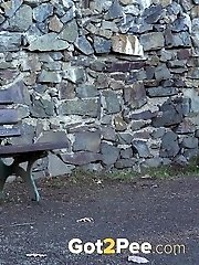 15 pictures - Redhead shows her pussy when she pees