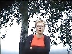 5 movies - Unsuspecting mature lady in glasses filmed urinating in a private setting Part 1