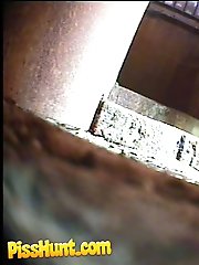 14 pictures - Pissing girl get busted and filmed in public loo