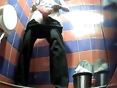 3 movies - Two chicks emptying her bladder in public toilet