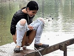 0  - Exotic babe pisses twice in this outdoor scene