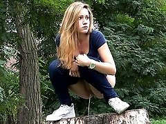 1 movies - Squatting outside a babe pisses on the ground