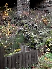 15 pictures - European girl in red tee pisses on fallen leaves